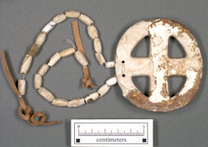 Shell gorget and beads recovered at Town Creek.
